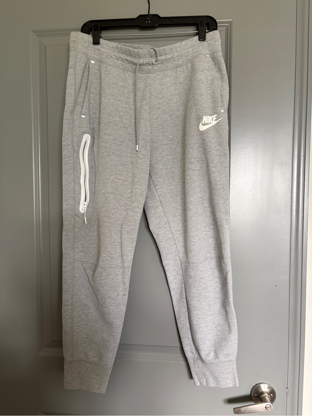Nike Tech Fleece Light Grey Jogger Sweatpants with White Logo